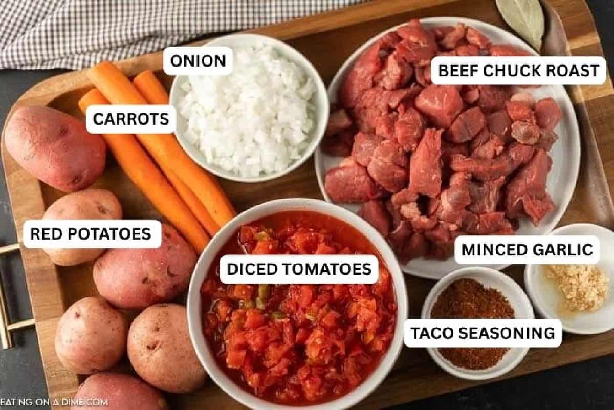 If you are looking for a new stew recipe, this delicious Crock Pot Mexican Beef Stew is the one to try. The tender beef and flavor packed broth taste amazing and even the kids will ask for more veggies! Slow Cooker Mexican Beef Stew is easy to make in the crockpot. #eatingonadime #crockpotmexicanbeefstew #mexicanbeefstewcrockpot Ingredients for recipe: Beef chuck roast, minced garlic, diced tomatoes, bay leaf, taco seasoning, red potatoes, carrots, onion, beef broth, cornstarch, cold water and fresh cilantro.