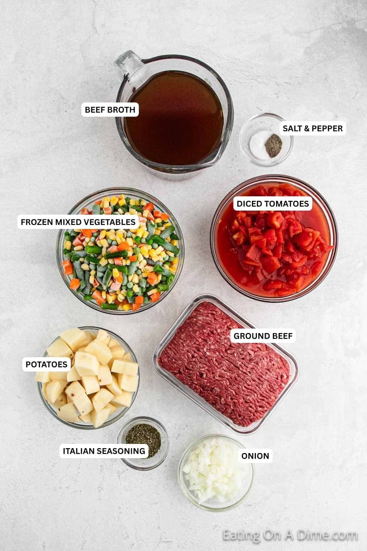 Ingredients for recipe: beef broth, salt, pepper, frozen mixed vegetables, diced tomatoes, ground beef, potatoes, Italian seasoning and onion.