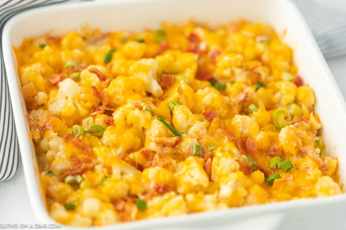 Keto loaded cauliflower is so delicious that you won't even miss the carbs. Each bite has lots of cheese, sour cream, bacon and more. 