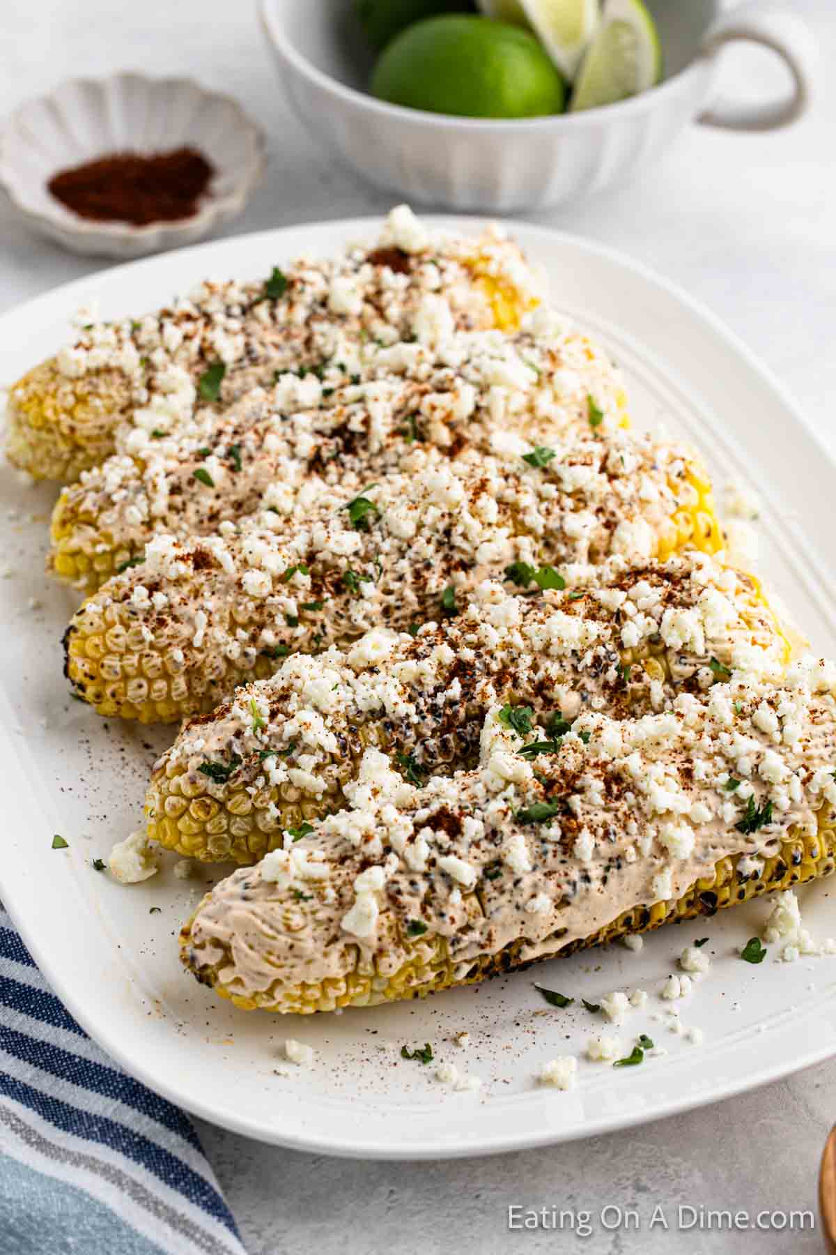 Mexican Corn on the cob placed on a platter