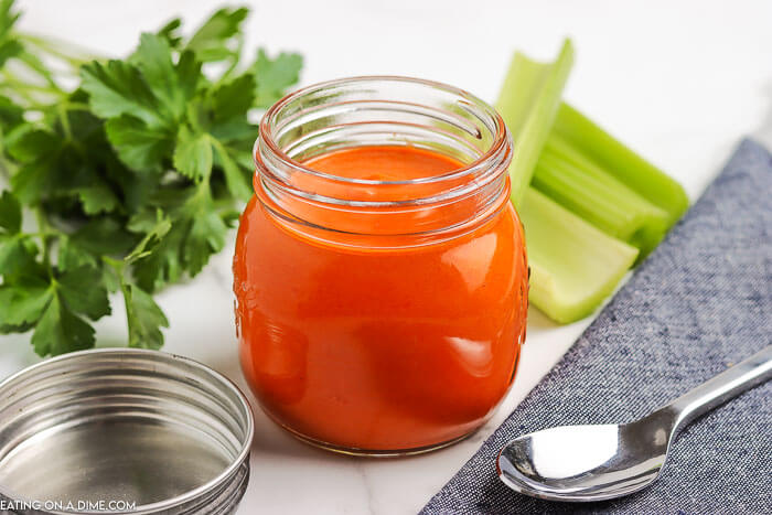 Learn how to make Buffalo sauce recipe and never buy store bought again. This is so easy and perfect for chicken wings, drumsticks and more. 
