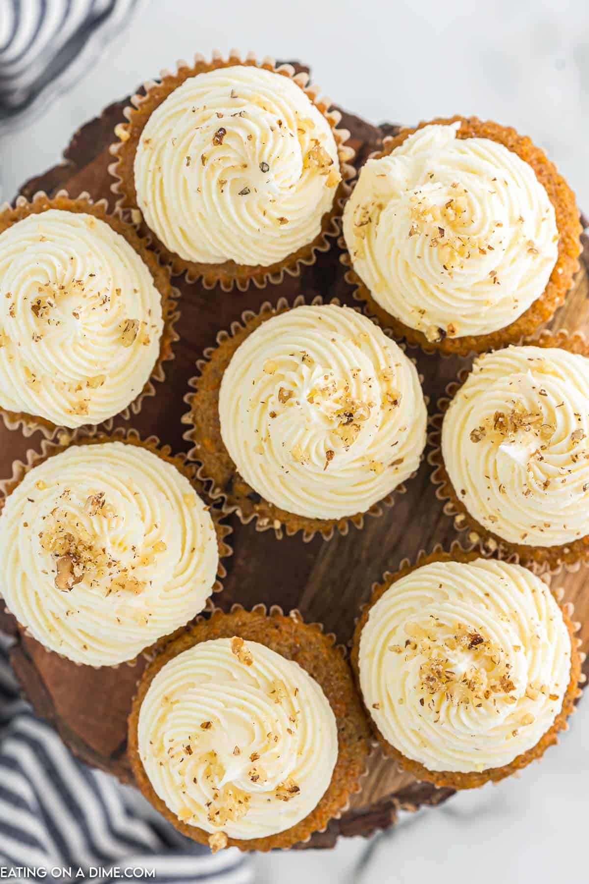 Close up image of carrot cake cupcakes on a platter