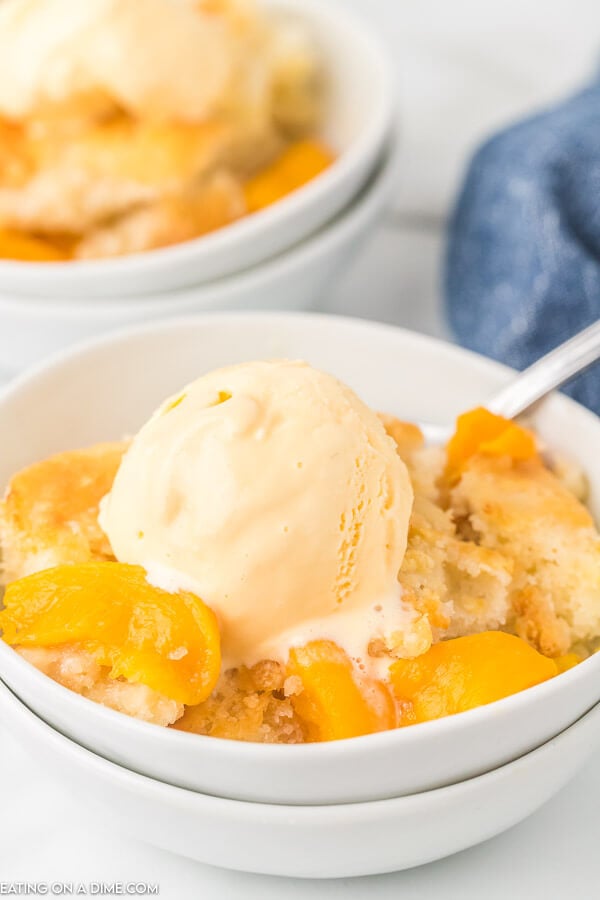 Come home to the best Crock pot peach cobbler recipe all ready to enjoy. The slow cooker does all of the work and we love it with ice cream. 