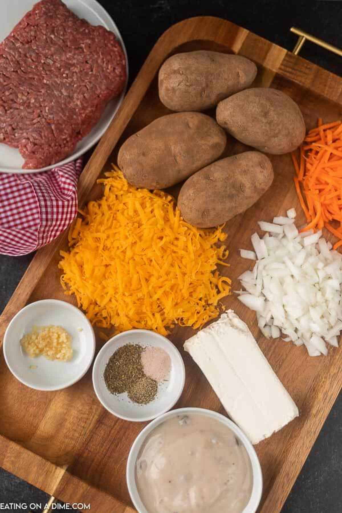 Ingredients to Make Crock Pot Cheeseburger Soup: Ground Beef, Potatoes, Onions, Shredded Carrots, Beef Broth, Cream of Mushroom Soup, Italian Seasoning, Minced Garlic, Salt, Pepper, Cheese Cheese and Cream Cheese 