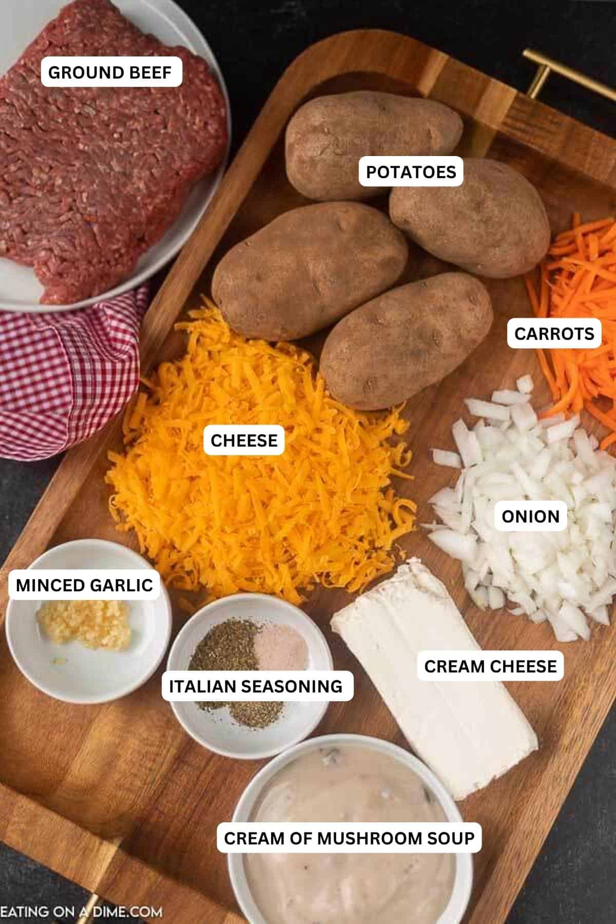 Ingredients for recipe: ground beef, potatoes, carrots, cheese, onion, minced garlic, Italian Seasoning, cream cheese and cream of mushroom soup.