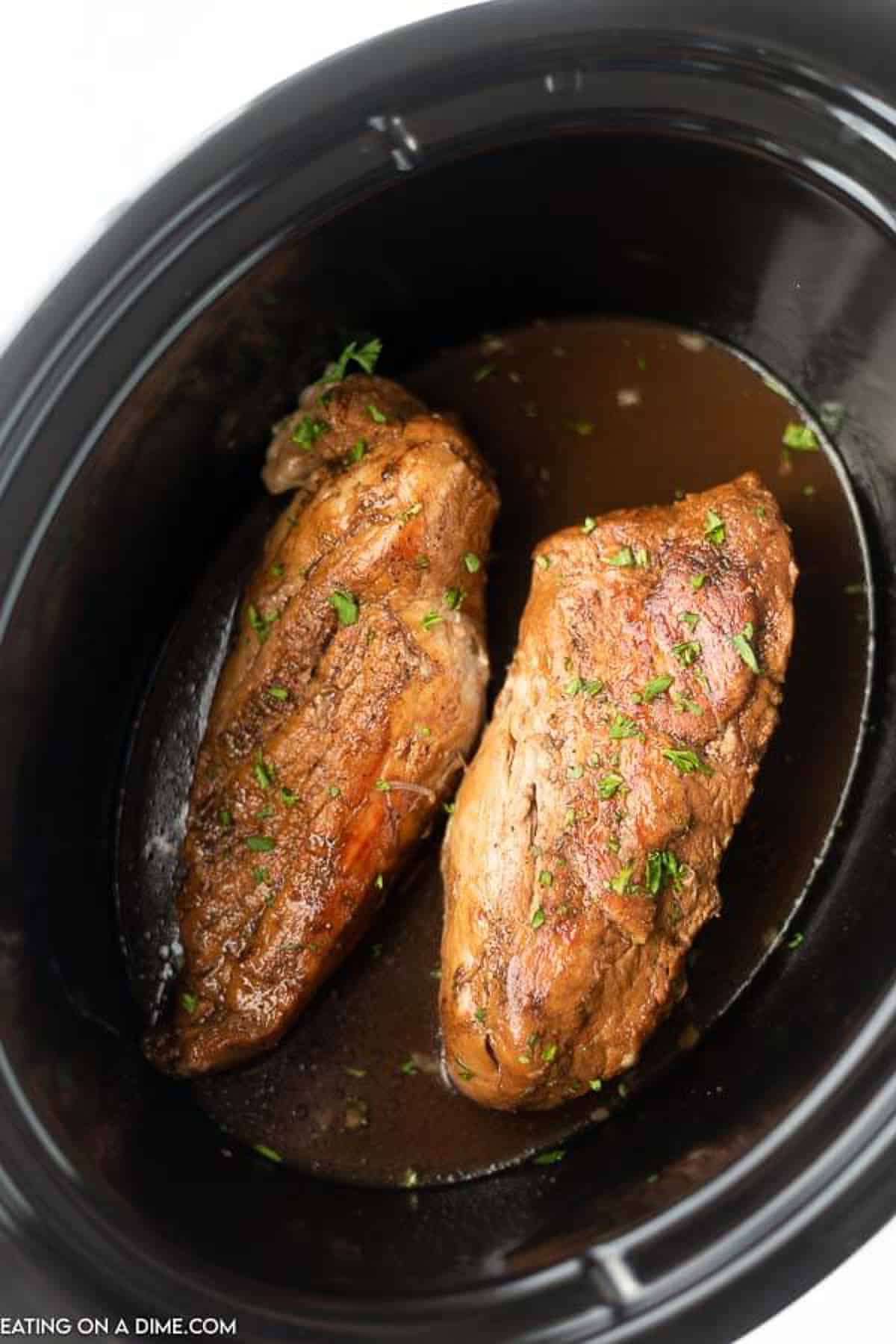 Cooked pork tenderloin in the slow cooker