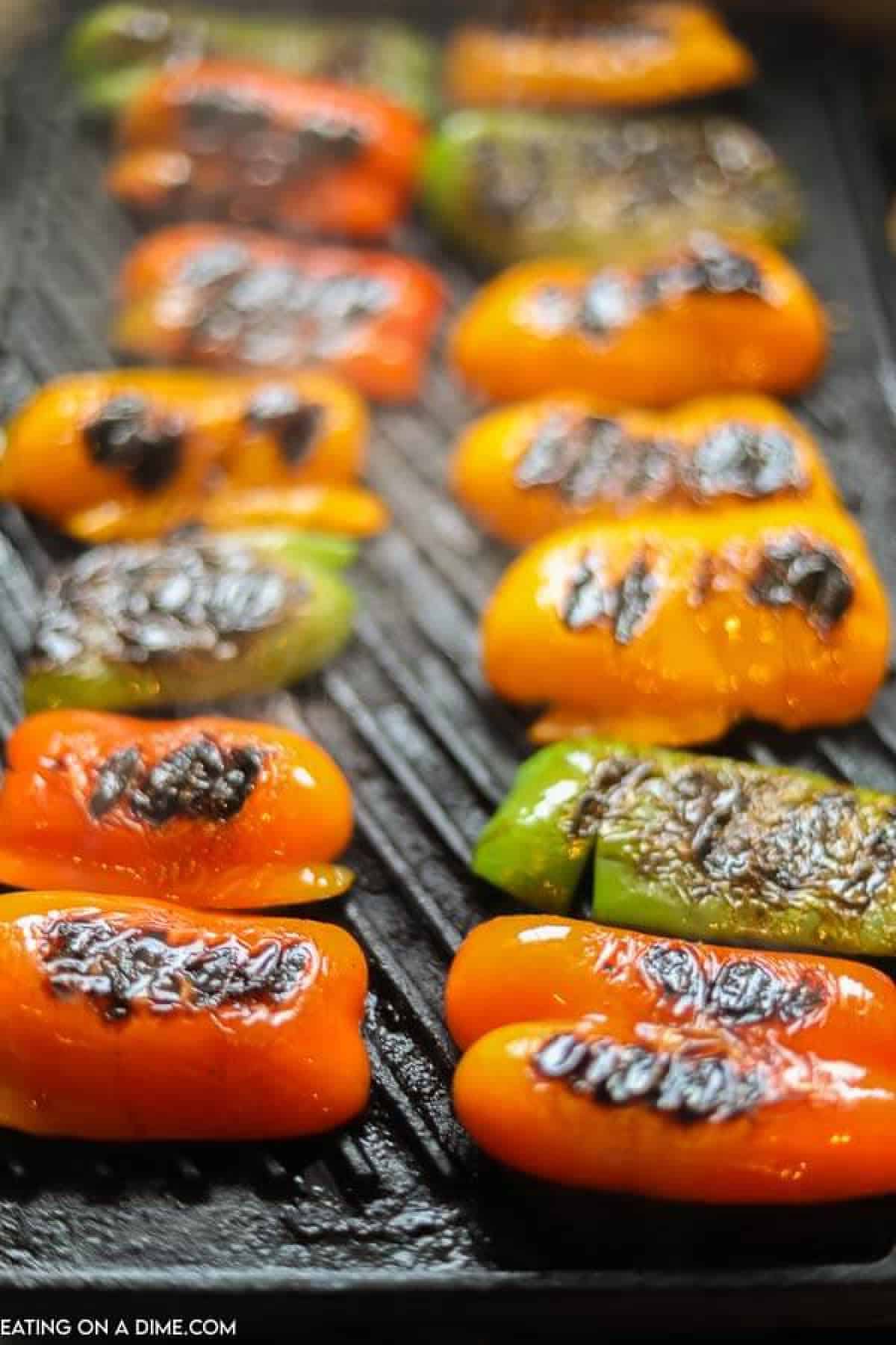 Learn how to grill bell peppers for the perfect side dish for chicken, fish and more. The grill makes this tasty with perfectly crispy edges. 