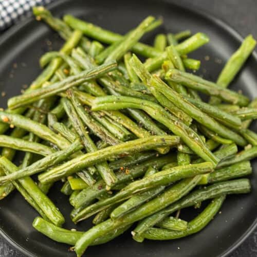 Oven roasted green beans on a plate