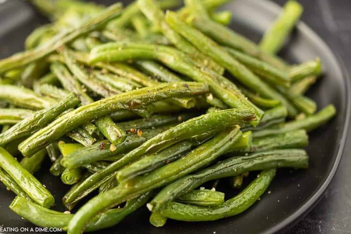 Oven roasted green beans on a plate