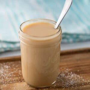 Homemade sweetened condensed milk is super easy to make with only 4 ingredients. Learn how to make this at home to save money. 