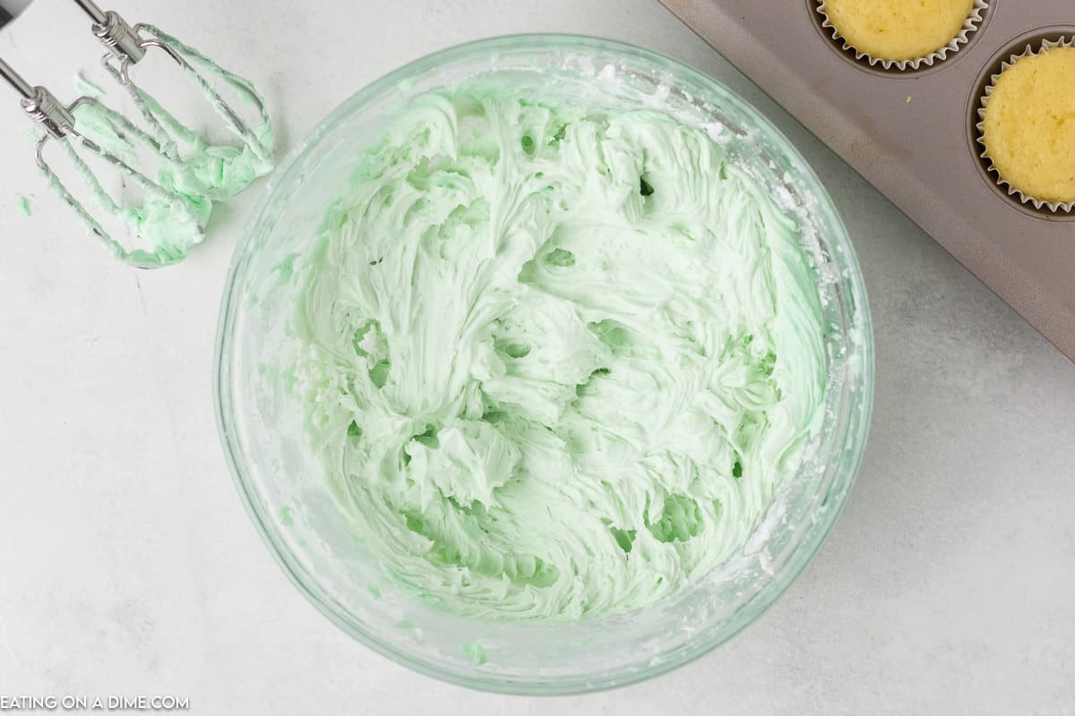 Green frosting in a bowl