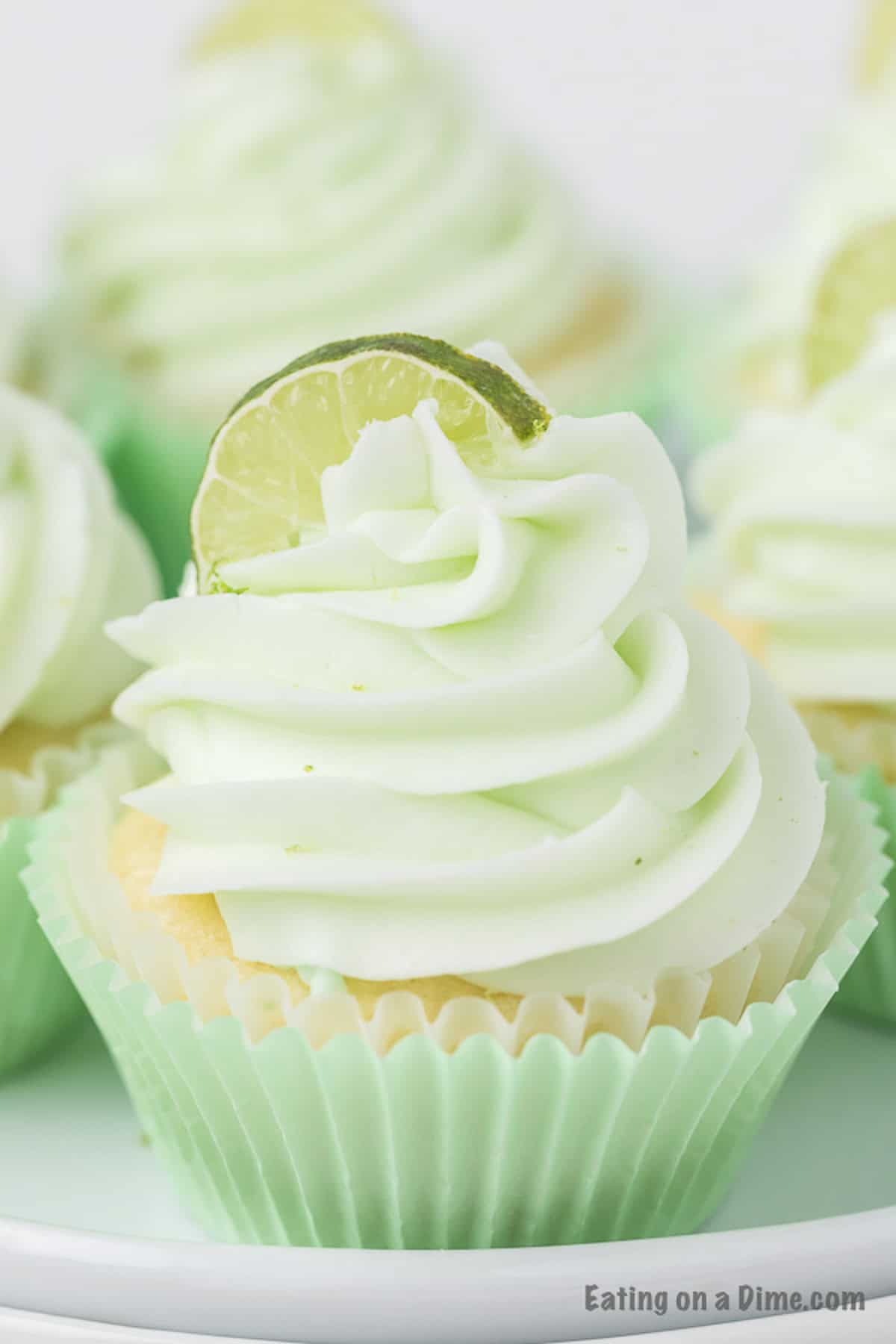 What's not to love about Key lime cupcakes? All the flavor of key lime pie gets baked into individual cupcakes for a treat no one can resist. Key Lime Cupcake topped with frosting and a slice of lime wedge