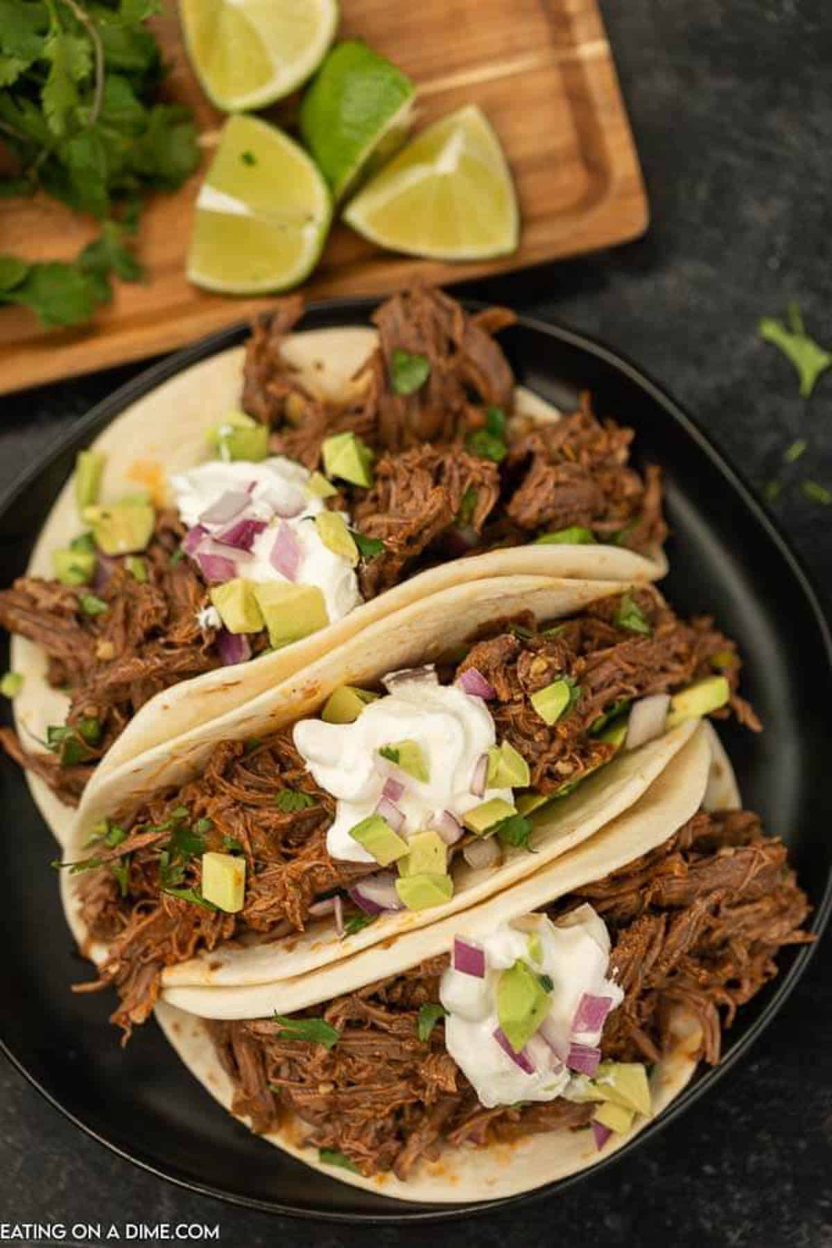 easy shredded beef tacos with limes
