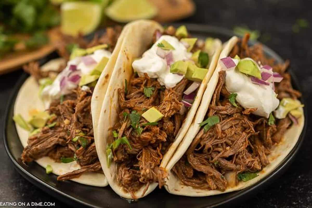 easy shredded beef tacos with limes