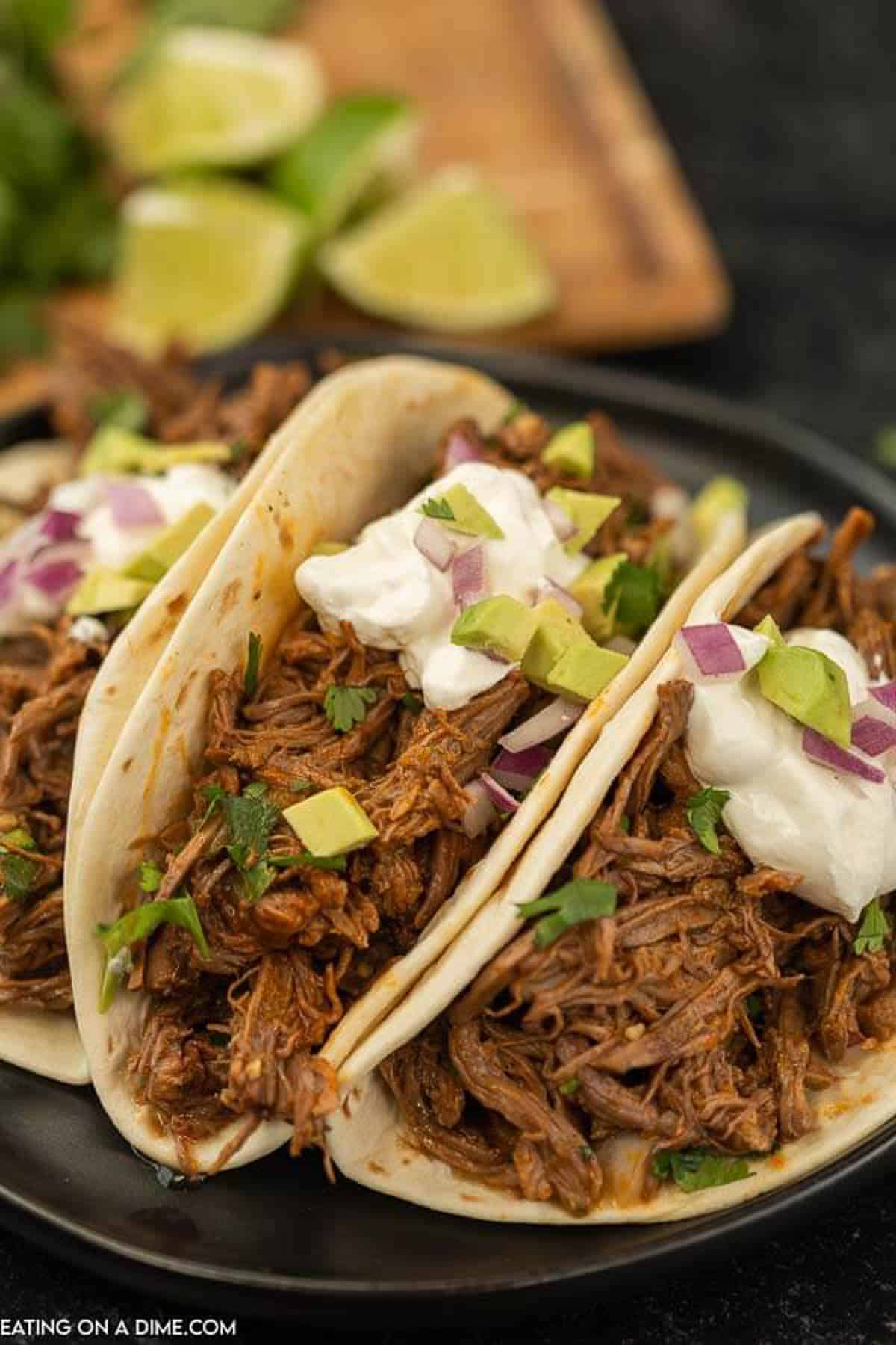 easy shredded beef tacos with limes