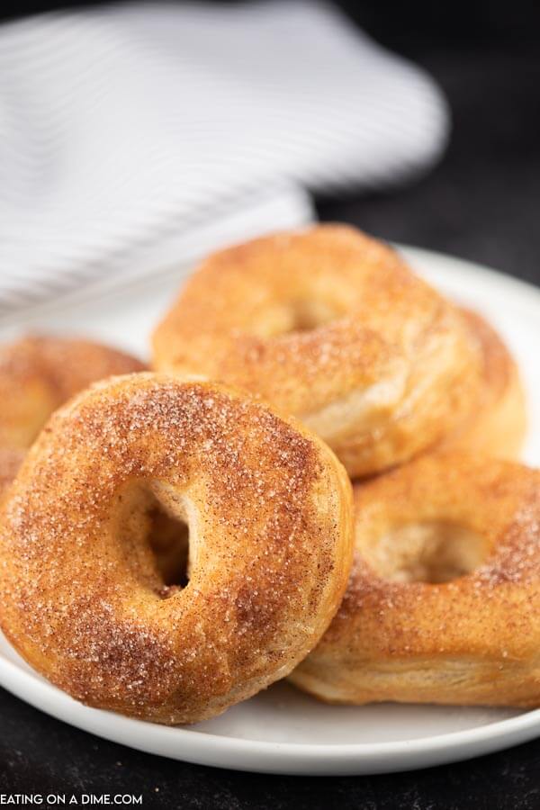 Close up image of donuts on a plate. 