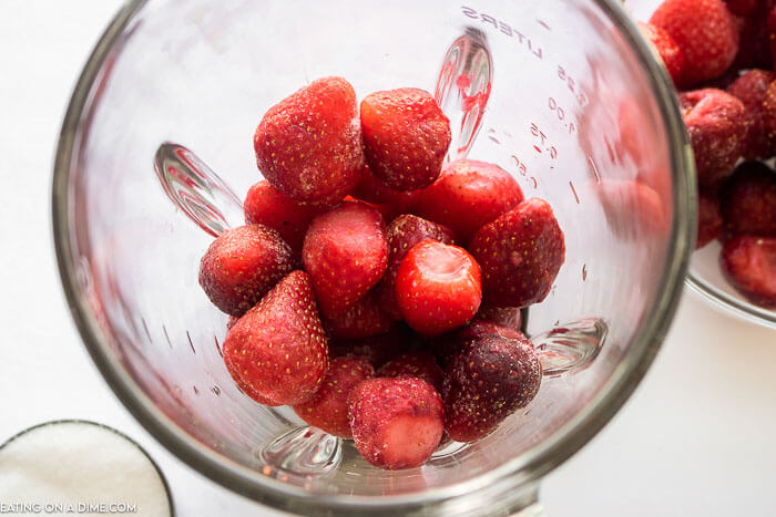 photo of frozen strawberries in blender.