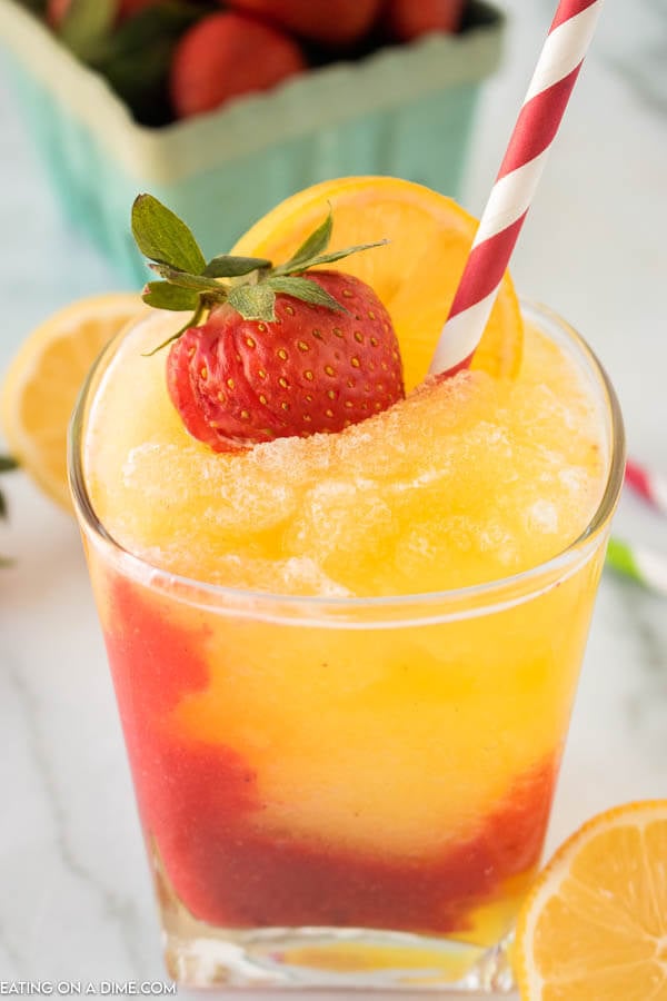 Closeup picture of frozen strawberry lemonade in glass. 