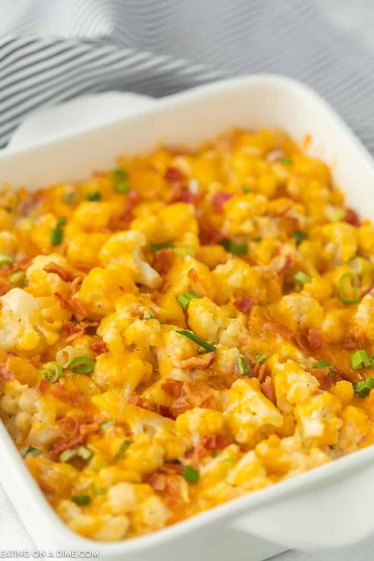 Keto loaded cauliflower is so delicious that you won't even miss the carbs. Each bite has lots of cheese, sour cream, bacon and more.ย Keto loaded cauliflower is so delicious that you won't even miss the carbs. Each bite has lots of cheese, sour cream, bacon and more.ย