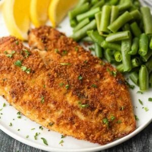 Enjoy crispy and delicious fish without frying or extra oil when you make this easy baked parmesan crusted tilapia. It is a family favorite.