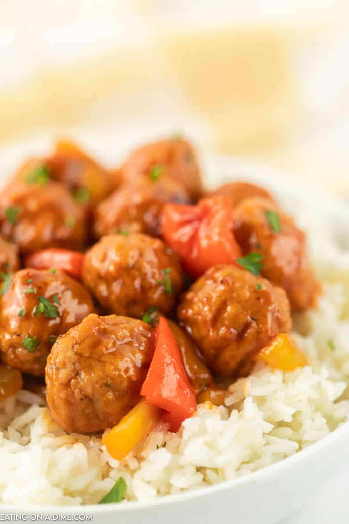 Crock pot sweet and sour meatballs have a delicious combination of flavors that you will love. Serve over rice for a quick dinner idea. 