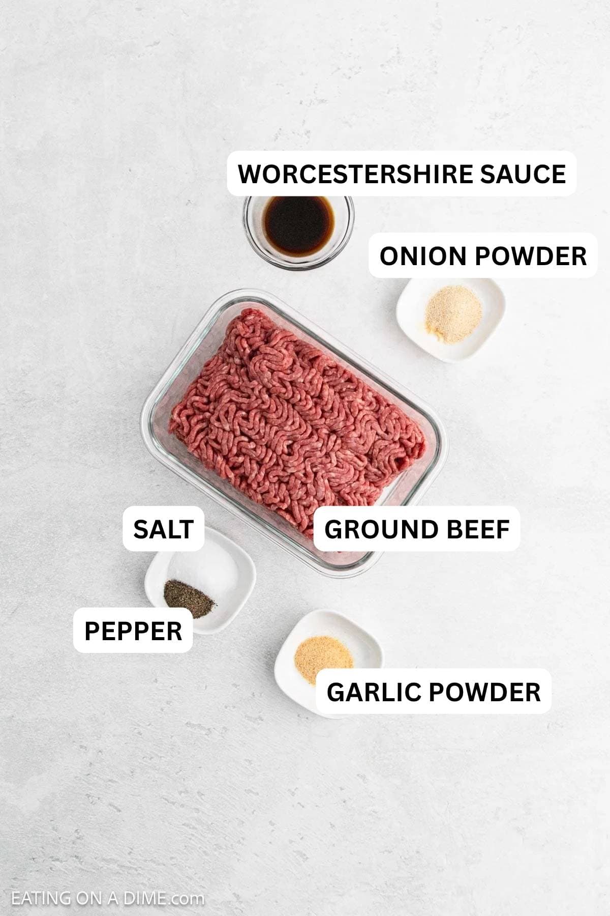 The ingredients required to make this burger recipe prepared on the counter top.