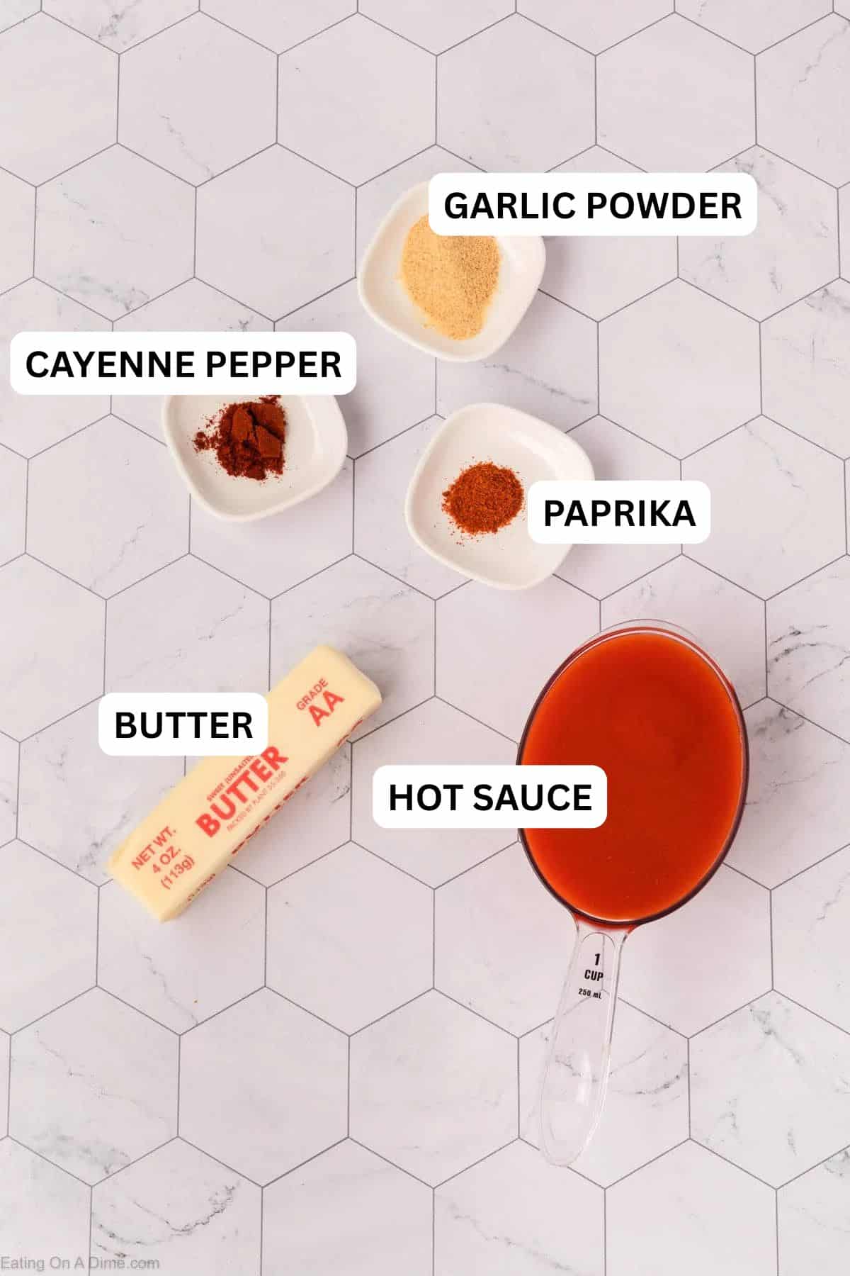 Ingredients for recipe: Hot Sauce, unsalted butter, garlic powder, paprika, cayenne pepper.
