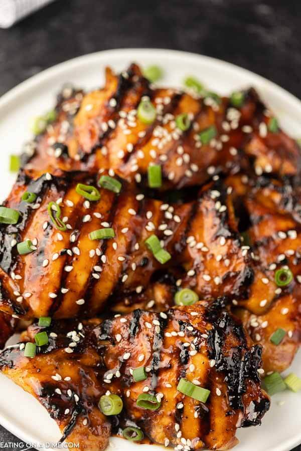closeup photo of grilled teriyaki chicken on plate.