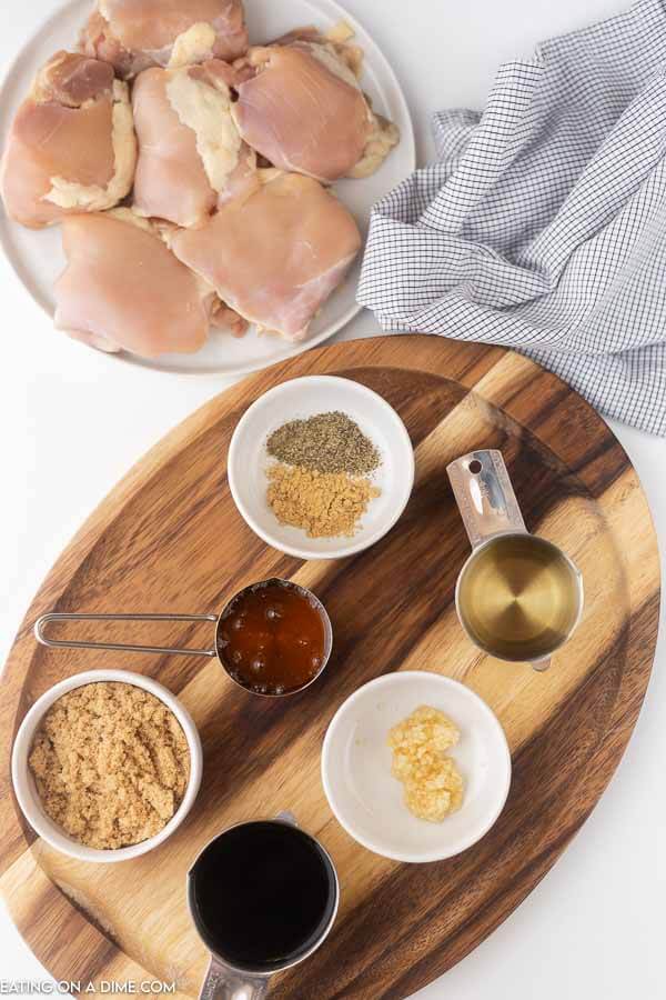 photo of ingredients: chicken thighs, seasoning, brown sugar, vinegar, honey.