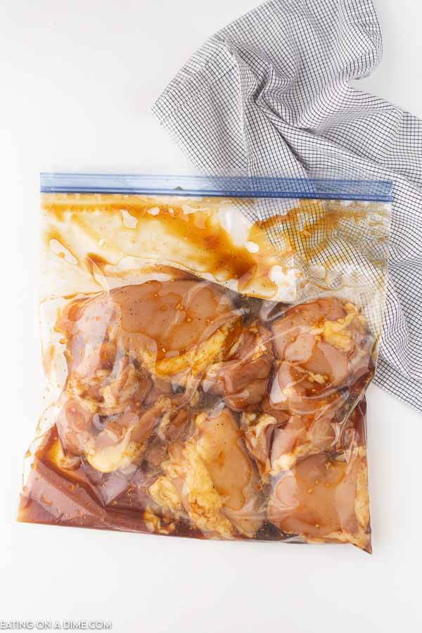picture of ziplock bag with chicken and marinade. 