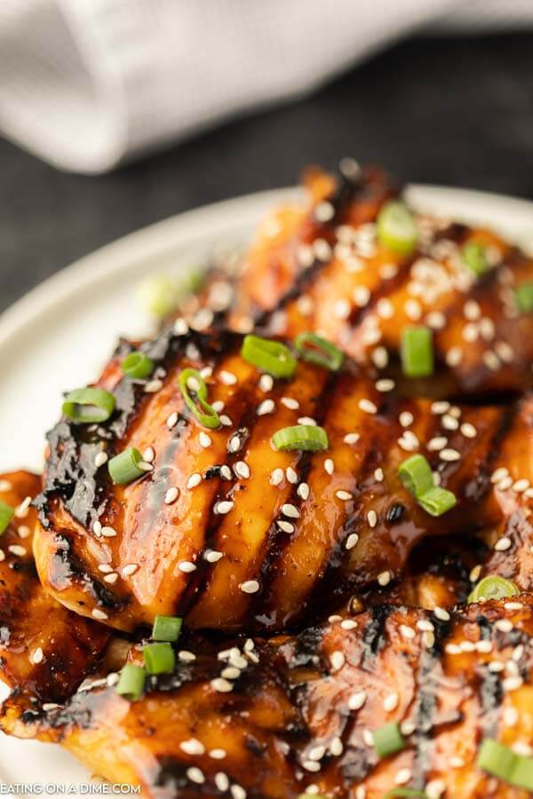 closeup photo of grilled teriyaki chicken on plate.