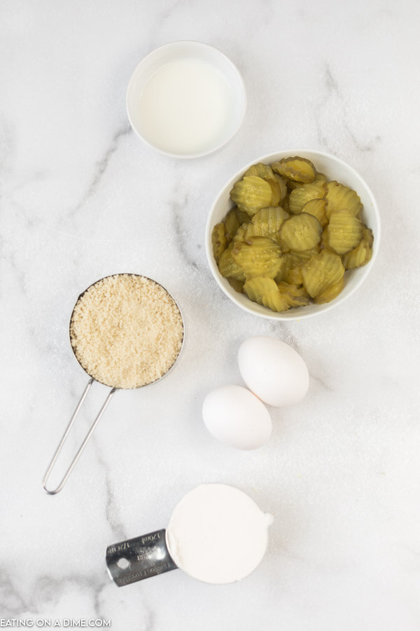 ingredients to make fried pickles: pickles, bread crumbs, eggs, milk.