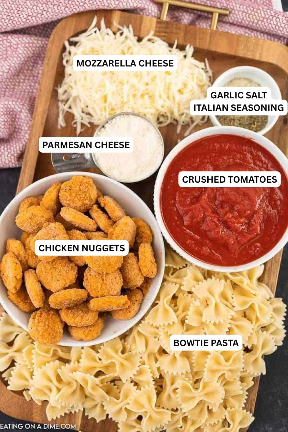 Ingredients for recipe: mozzarella cheese, garlic salt, Italian seasoning, parmesan cheese, crushed tomatoes and chicken nuggets.