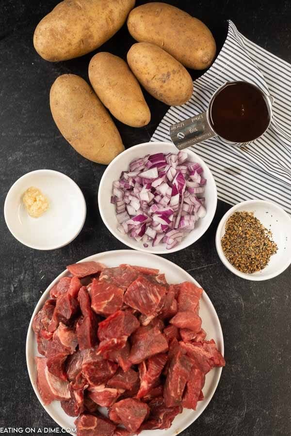 ingredients needed for recipe: potatoes, beef broth, onion, seasoning, stew meat
