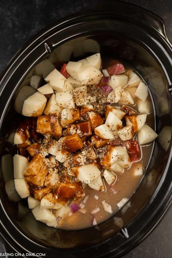 crock pot of ingredients ready to be cooked