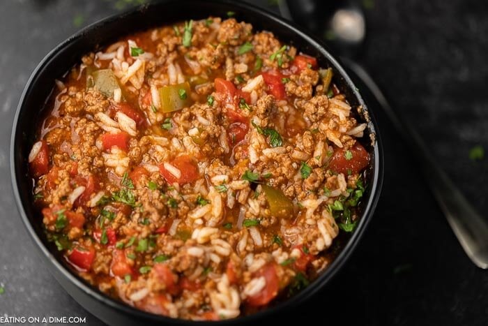 Close up image of a black bowl of stuffed pepper soup. 