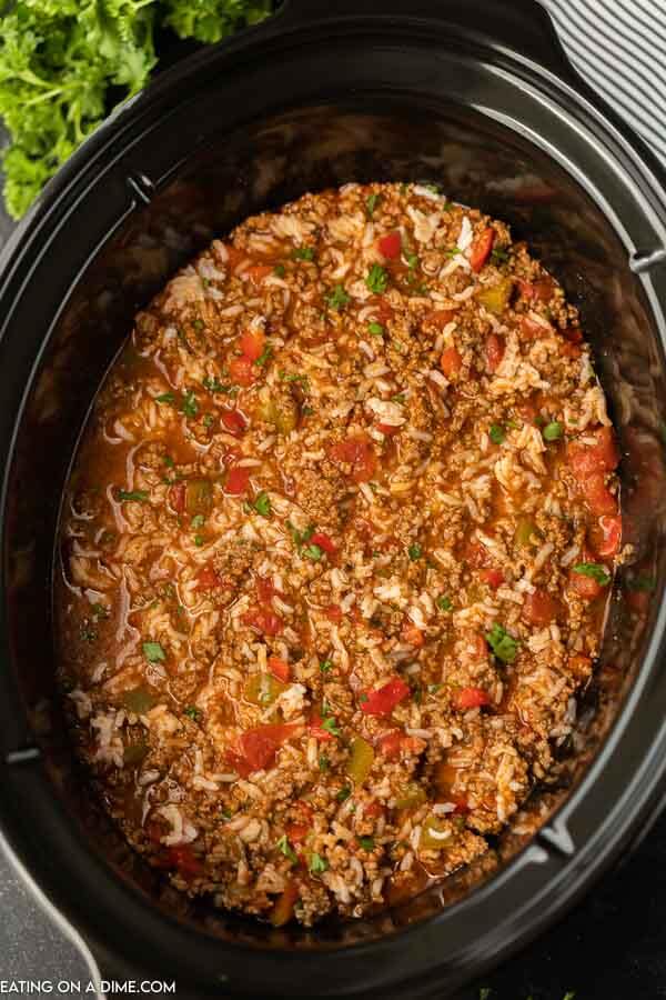 Close up image a stuffed pepper soup in a crock pot. 