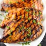 Balsamic glazed chicken is the perfect blend of tangy and sweet while being so easy. We love to grill the chicken but it can also be baked.  