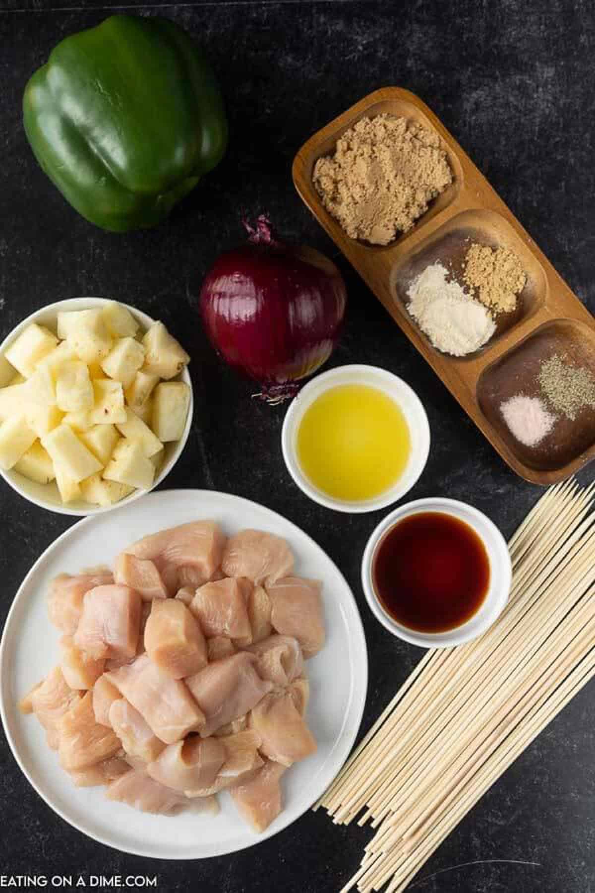 A photo of the all the ingredients needed to make Hawaiian Chicken Kabobs and Skewers needed to assemble the kabobs. 