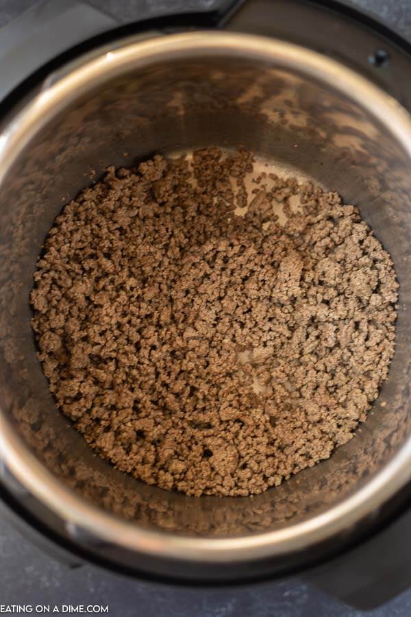Close up image of ground beef in instant pot. 