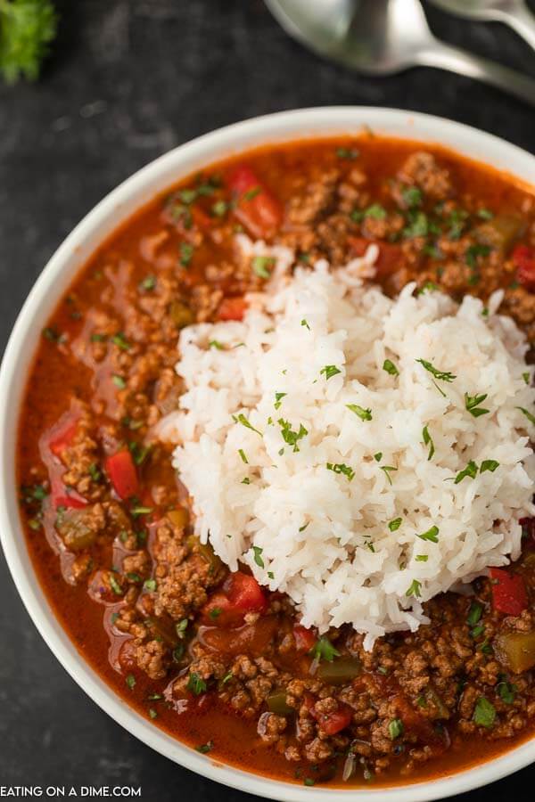 Close up image of stuffed pepper soup with white rice. 