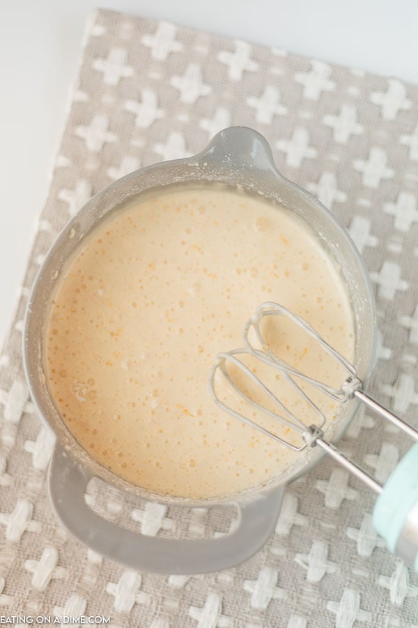 photo of cake batter in bowl with mixer