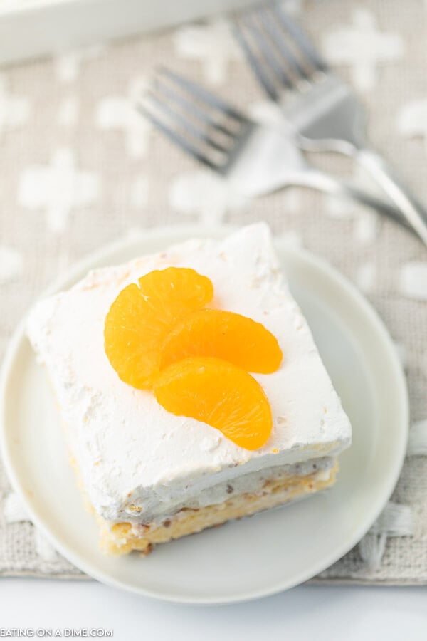 photo of mandarin cake slice on plate