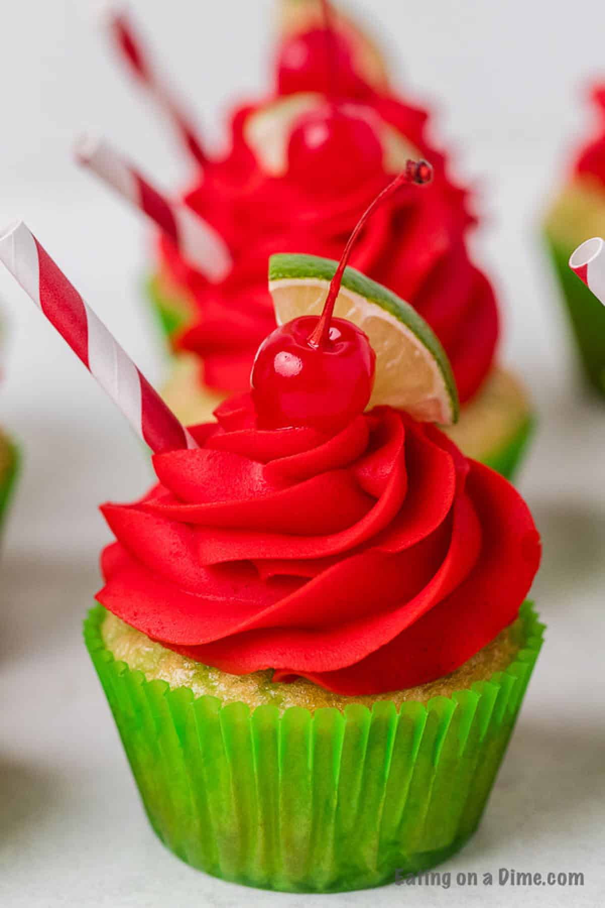 cherry limeade cupcake in a green cupcake liner