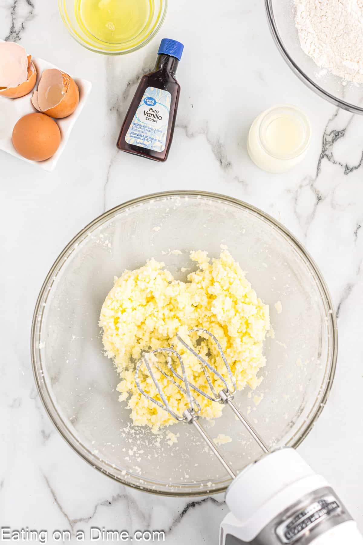 Beat together sugar, butter and eggs together in a bowl