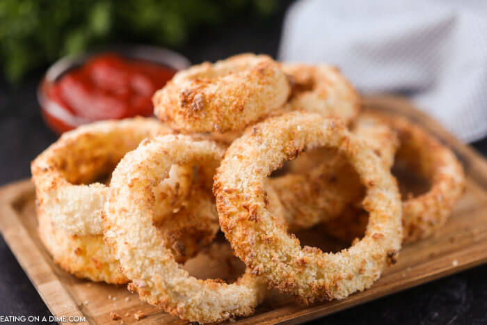 pile of onion rings on cutting board