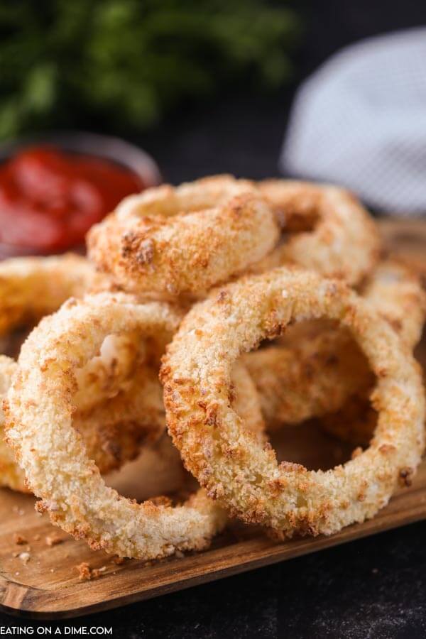pile of onion rings on cutting board