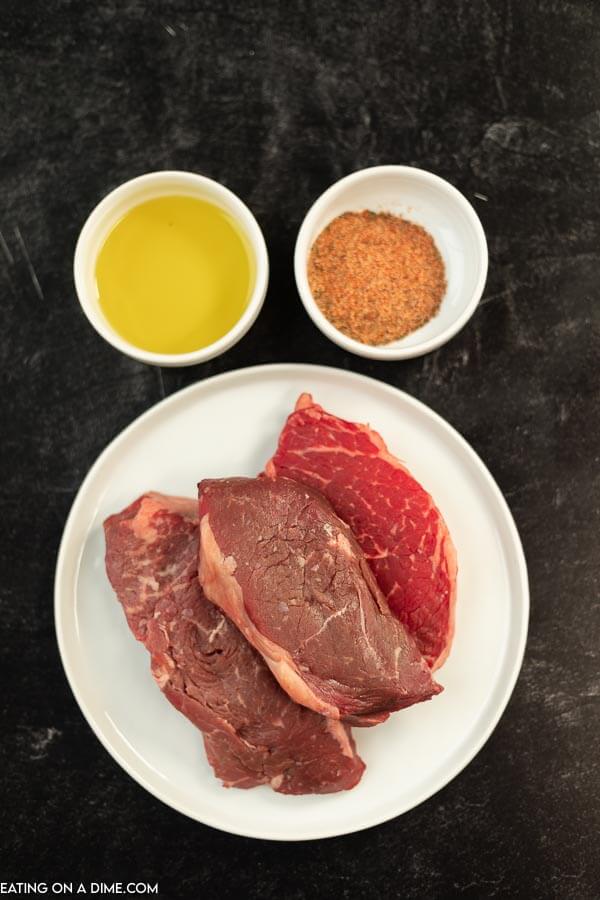 ingredients for air fryer steak- steak, seasoning and olive oil. 