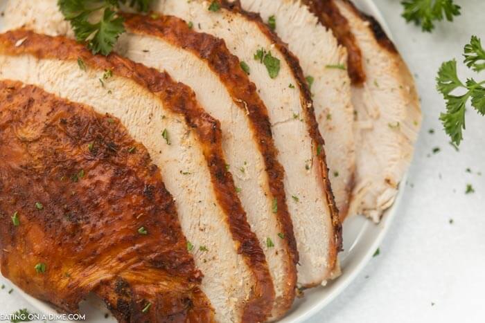 sliced turkey breast on platter