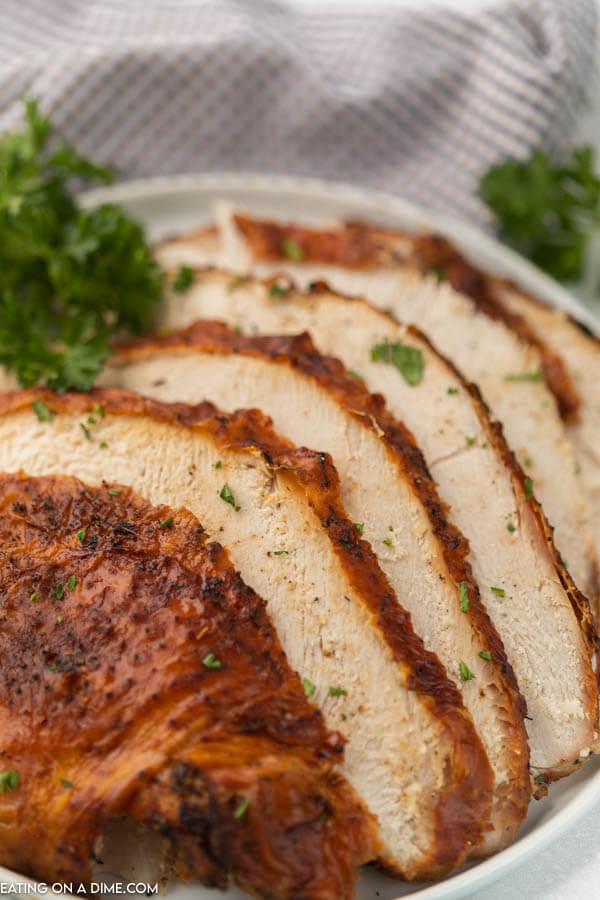 sliced turkey on platter